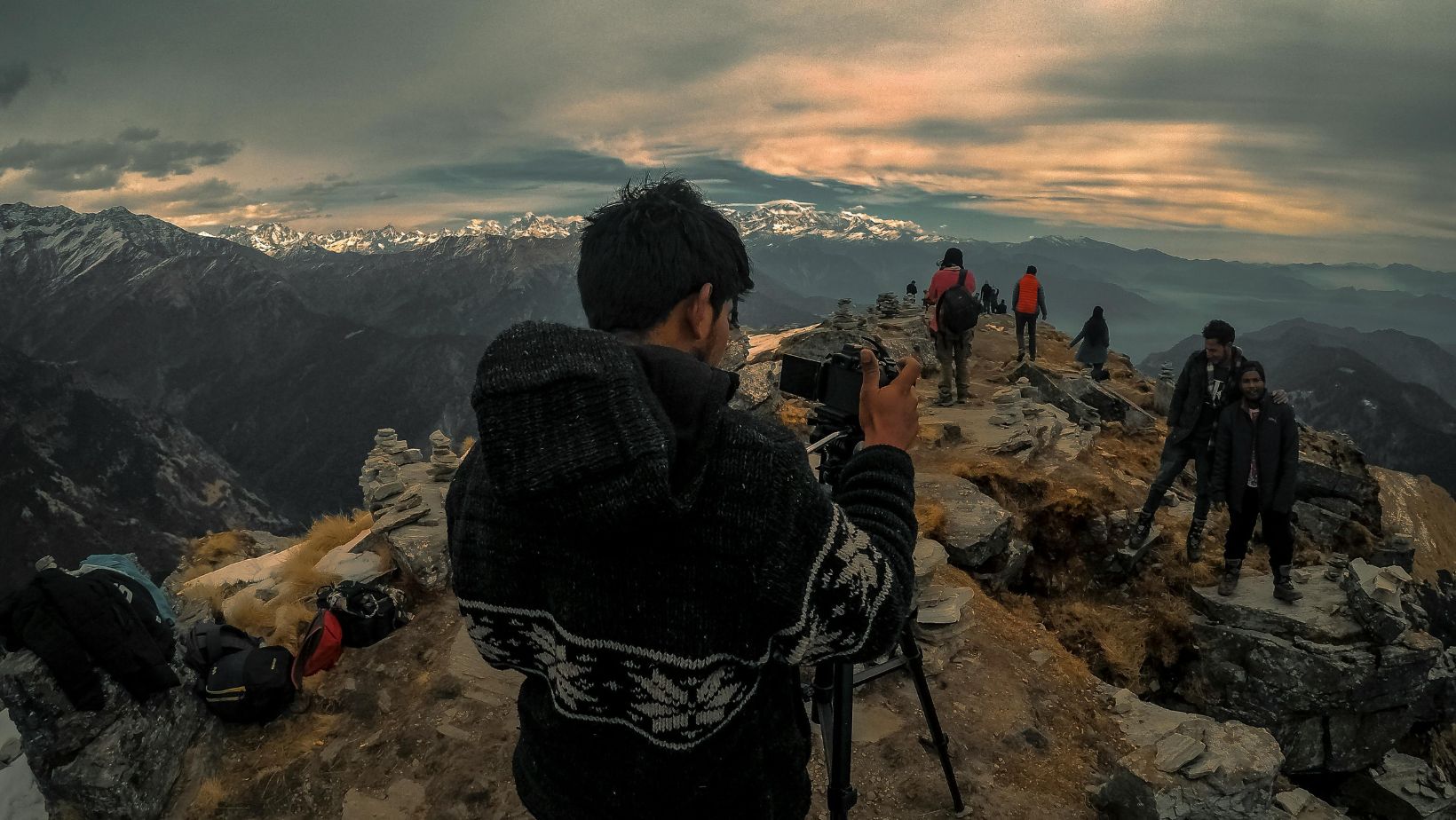 man taking photos of people